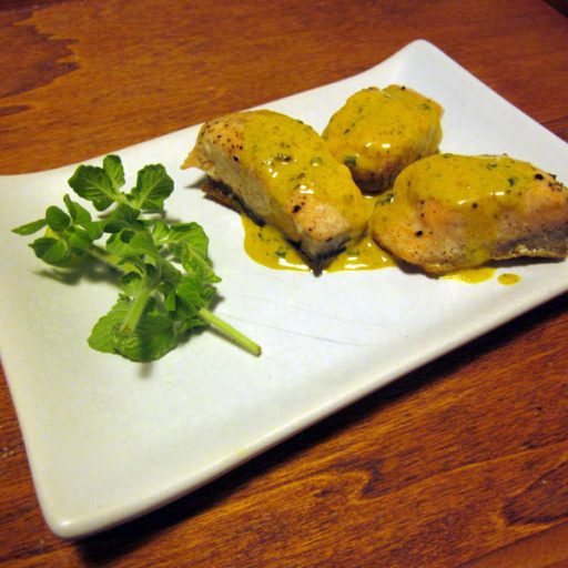 Tranci di salmone in salsa di legumi